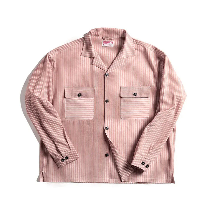 A light pink pinstripe shirt with thin white vertical stripes, two front chest pockets with flaps, black buttons, and a notched Cuban collar, crafted from high-quality cotton and laid flat on a white background.