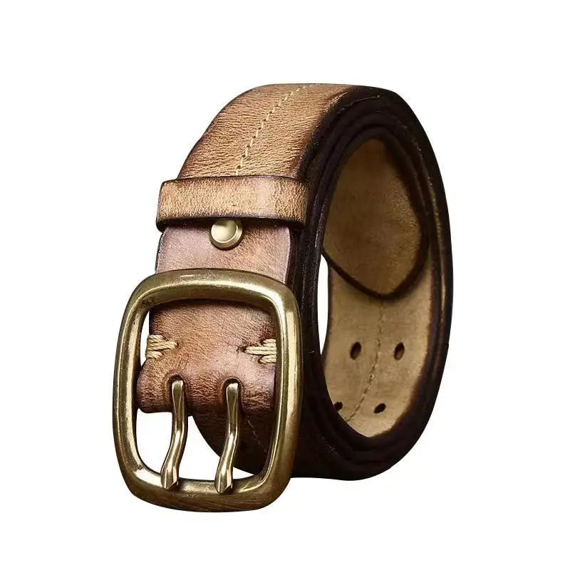 A rolled-up vintage-inspired distressed leather belt with a brass double-prong buckle and contrast stitching, displayed on a white background.