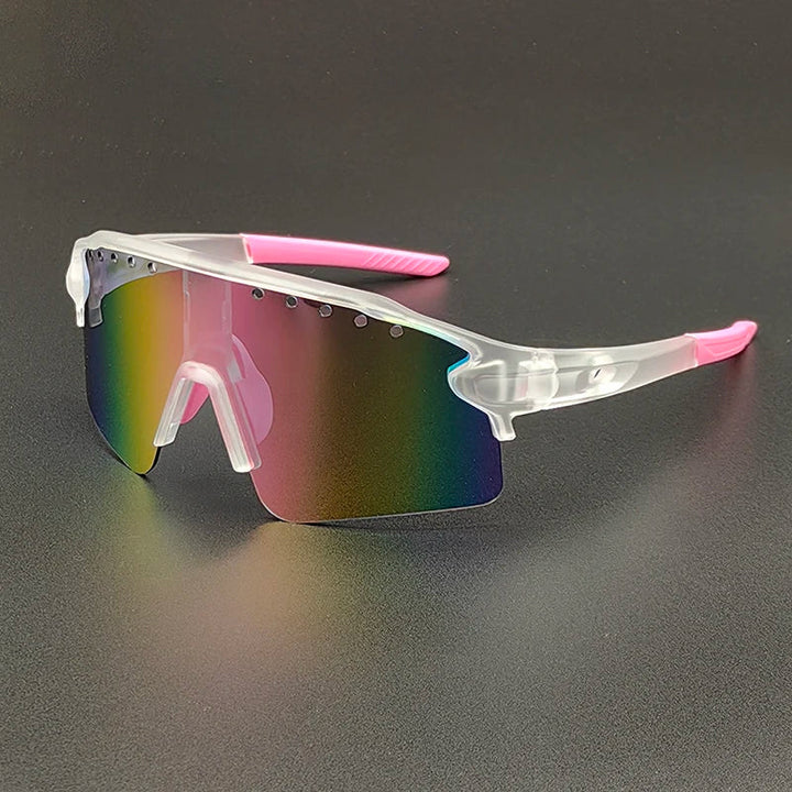 Translucent oversized sunglasses with pink accents and a single, large, rainbow-tinted lens are displayed on a dark surface. The frame is clear with pink details on the nose pads and temple tips, offering stylish UV400 protection.