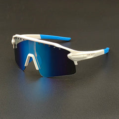 Sporty oversized sunglasses with a white and blue frame, blue reflective polarized lenses featuring UV400 protection, and a wraparound design, placed on a black surface.