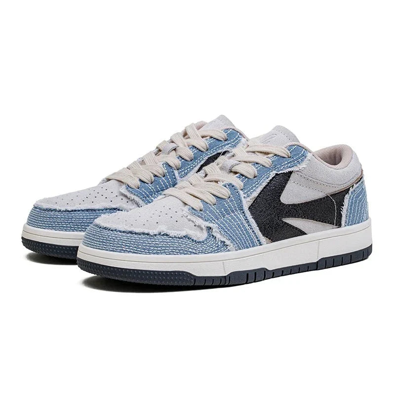 A pair of Denimwave 1986 Pro Sneakers with light blue denim and white uppers, cream-colored laces, a black side accent, and white midsoles with black outsoles for an authentic 80s aesthetic. EVA midsole cushioning provides all-day comfort.