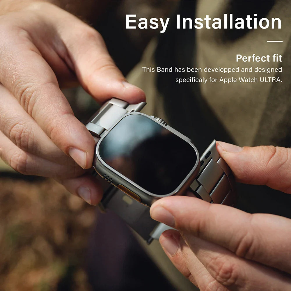 Close-up of hands holding an Apple Watch Ultra with a metal band, demonstrating easy installation. The text highlights the band’s perfect fit, lightweight durability, and specific design for the Apple Watch Ultra.