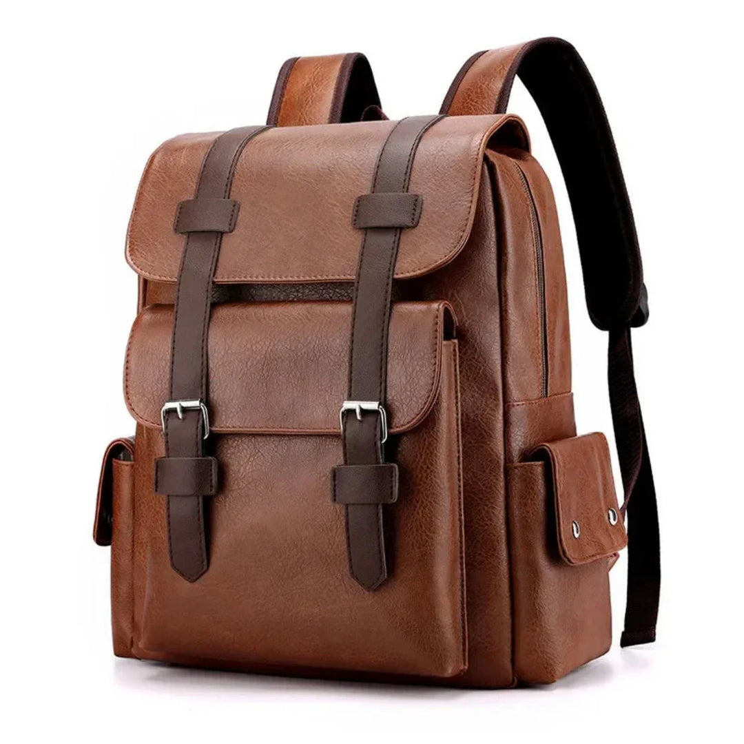 A brown leather backpack with dark brown straps, a front pocket with buckle closures, side pockets with snap buttons, and padded shoulder straps. Stylish and structured, it offers spacious compartments to keep your essentials organized.