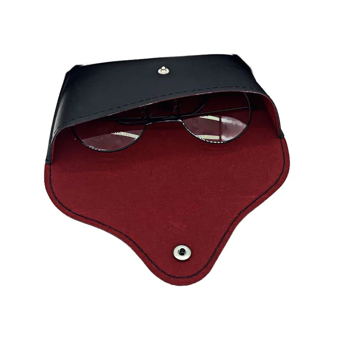 A pair of eyeglasses is partially visible inside an open, black and red vegan leather sunglasses case with a snap button closure, shown on a white background for a protective touch.