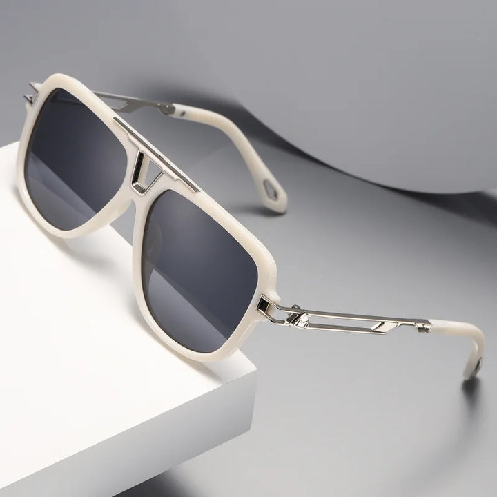 Off-white, luxury designer square sunglasses with silver metal arms and dark lenses rest on a white and gray surface in a minimalist setting.