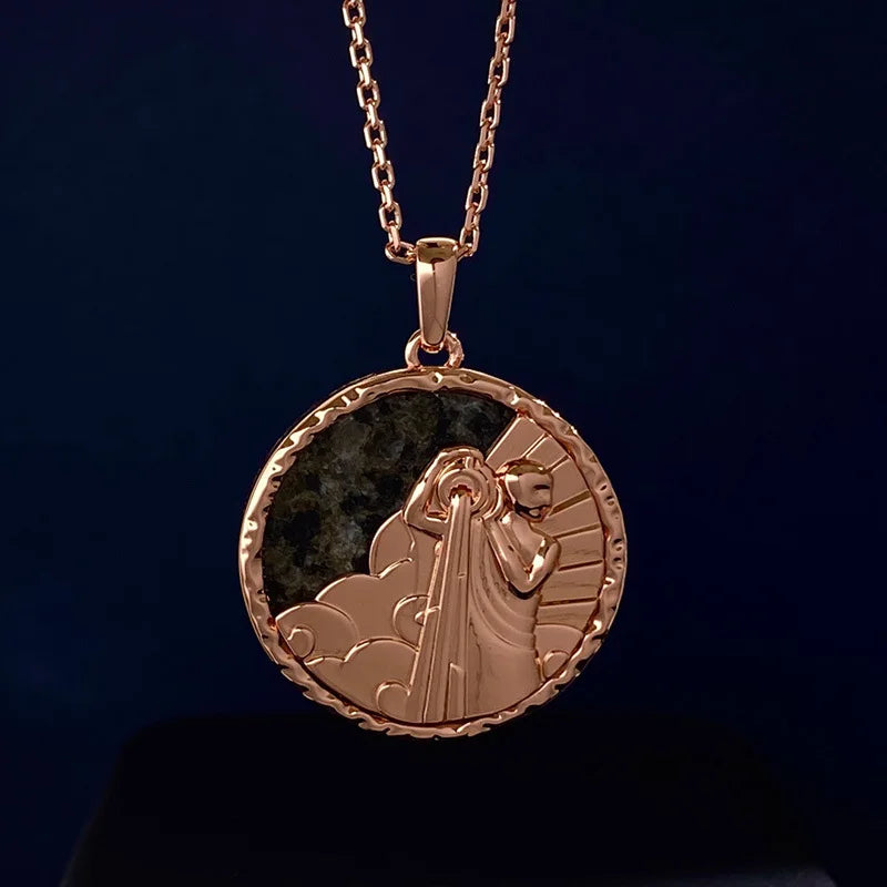 A gold zodiac necklace featuring a round medallion with an engraved figure holding a torch, surrounded by clouds and rays, set against a dark background—a timeless piece of astrology jewelry.