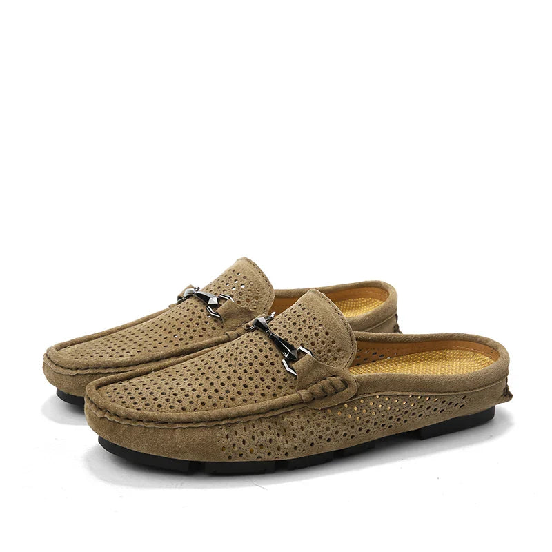 A pair of tan suede breathable loafers with perforated uppers, decorative metal accents, innovative cushioning insoles, and black rubber soles. The shoes are positioned side by side on a white background.