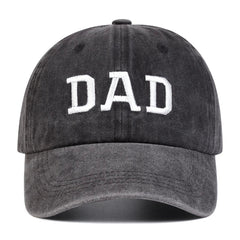 A black embroidered cap with DAD in bold white letters on the front, perfect for vintage streetwear lovers and those seeking a classic Mom & Dad cap style.