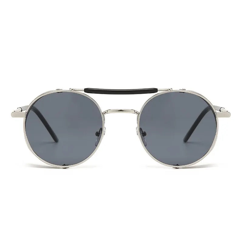 Front view of steampunk sunglasses featuring silver metal frames, dark gray lenses, and a black bar across the top for a bold statement look.