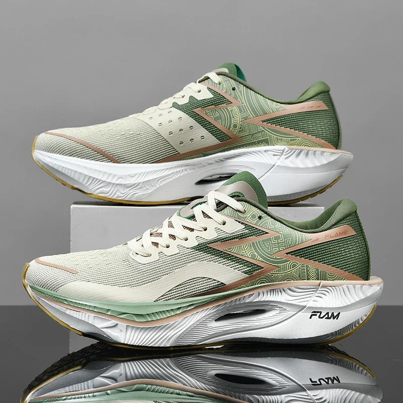 A pair of modern running shoes with green and beige mesh uppers, peach accents, and white, sculpted soles featuring a shock-absorbing sole and FLAME branding, displayed against a gray background.