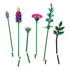 Six LEGO flowers with green stems and colorful petals in purple, pink, blue, and white, create a vibrant Wildflower Bouquet using playful building blocks, arranged upright against a white background.