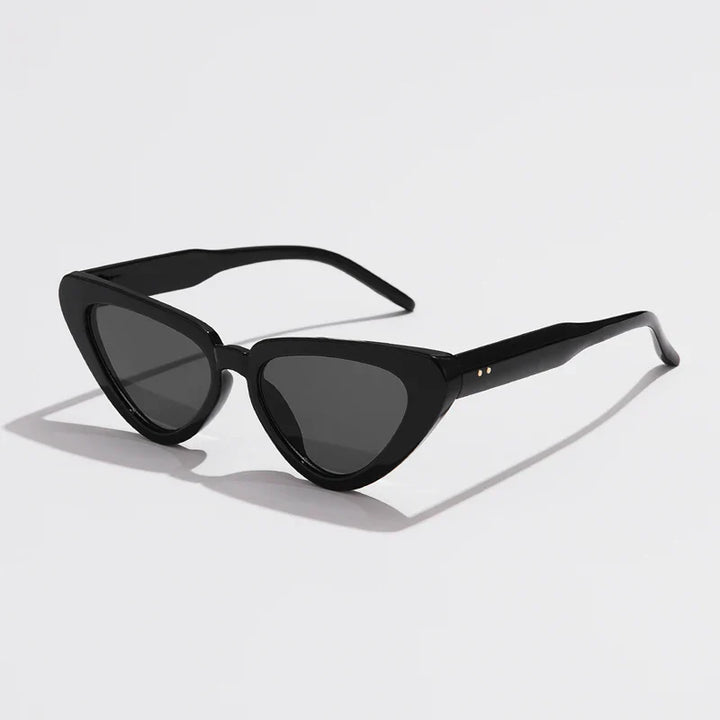 Black cat-eye sunglasses with dark lenses, angled arms, and a glossy finish offer UV400 sun protection. This lightweight eyewear is displayed on a white background.