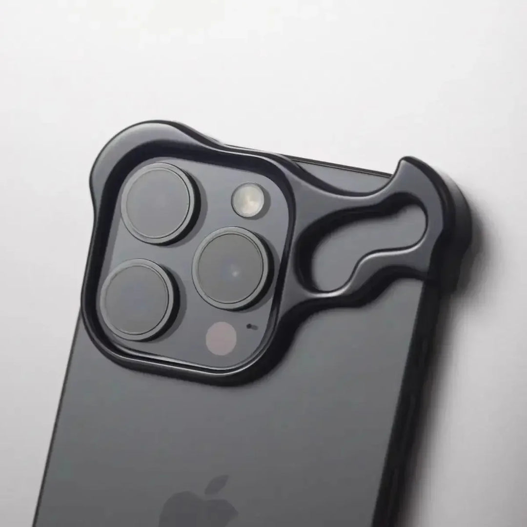 A black smartphone with a protective camera cover shaped like a cartoon bear’s face, featuring lens film protection that outlines the camera lenses and flash.