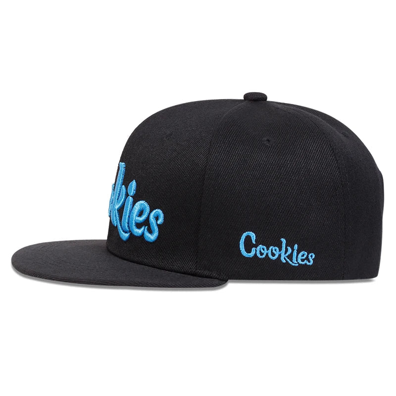 A black flat-brim baseball cap with Cookies embroidered in light blue on the front and side, made from breathable fabric for comfort.