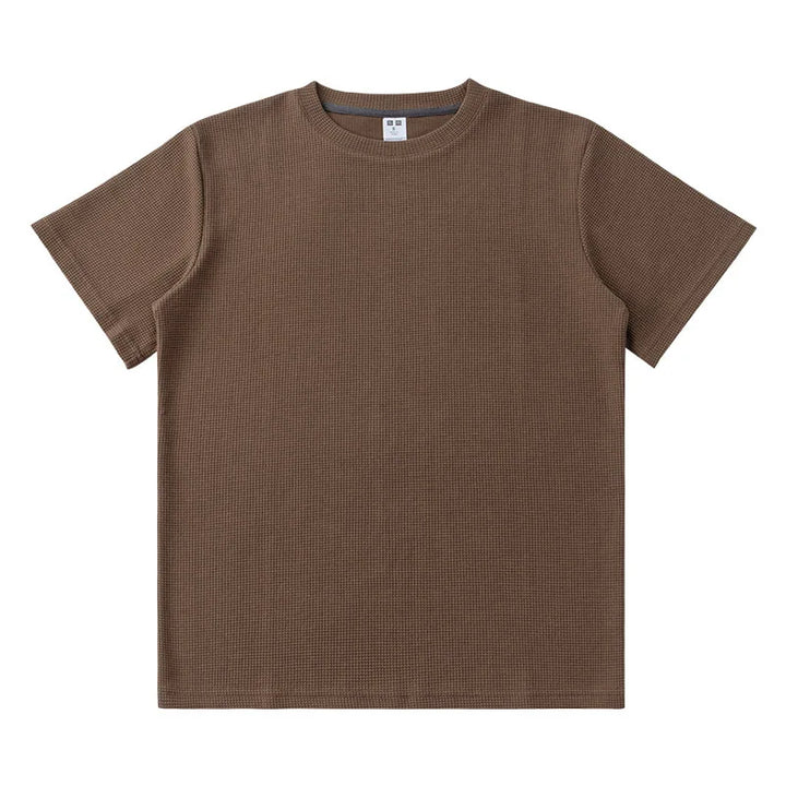A plain, short-sleeved, brown waffle knit t-shirt crafted from 260G cotton, laid flat on a white background.