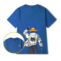 Blue cotton knit crew neck T-shirt featuring a large graphic art design on the back of an anime-style character wearing a straw hat and camouflage jacket, plus a small matching graphic on the front left chest.