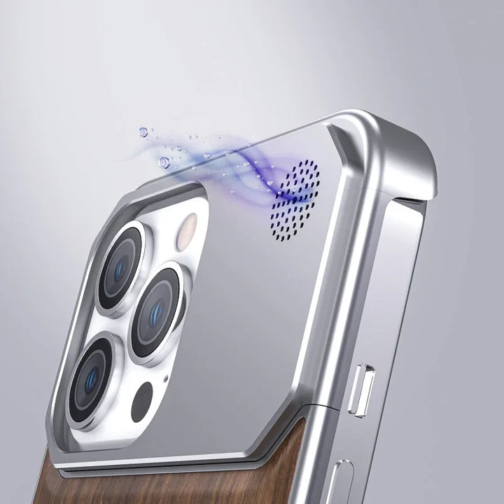 A close-up of a stylish smartphone with a metallic frame and luxury phone case in wood, featuring triple rear cameras. Blue vapor-like graphics emerge from a small speaker grille on the top corner.