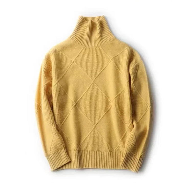 A yellow, long-sleeve cashmere turtleneck sweater with a ribbed collar, cuffs, and hem. This cozy layering sweater features a large diamond knit pattern across the fabric. The image is taken against a white background.
