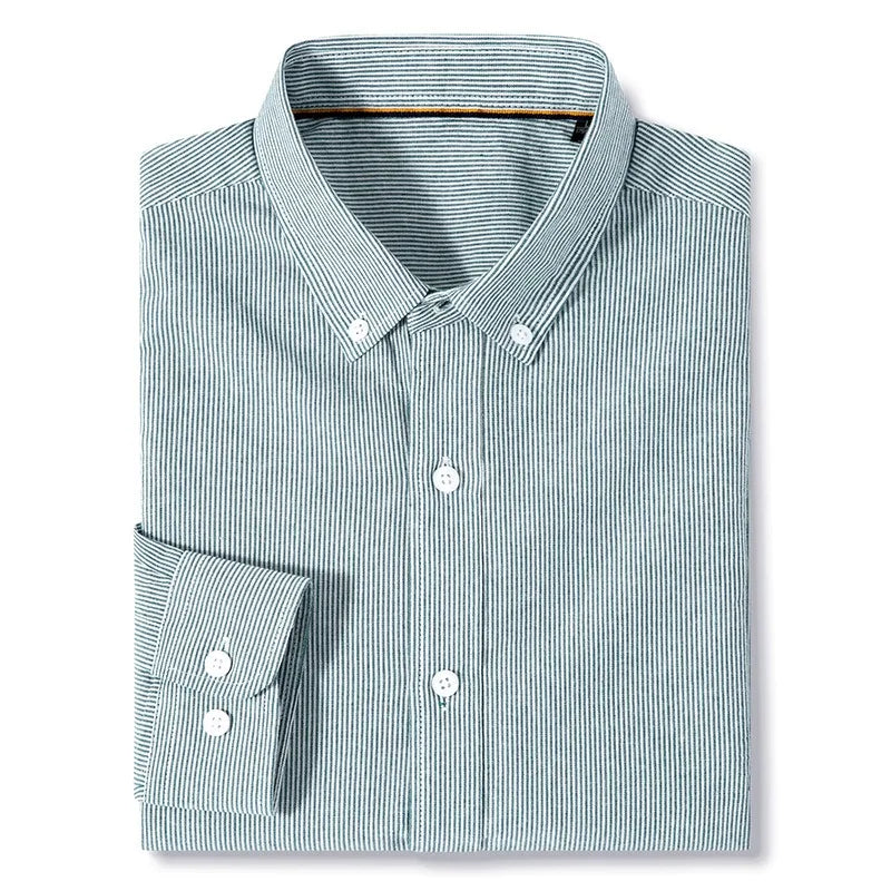 A neatly folded cotton button-up classic pinstripe shirt with thin green and white vertical stripes, a button-down collar, white buttons, and is conveniently machine washable.