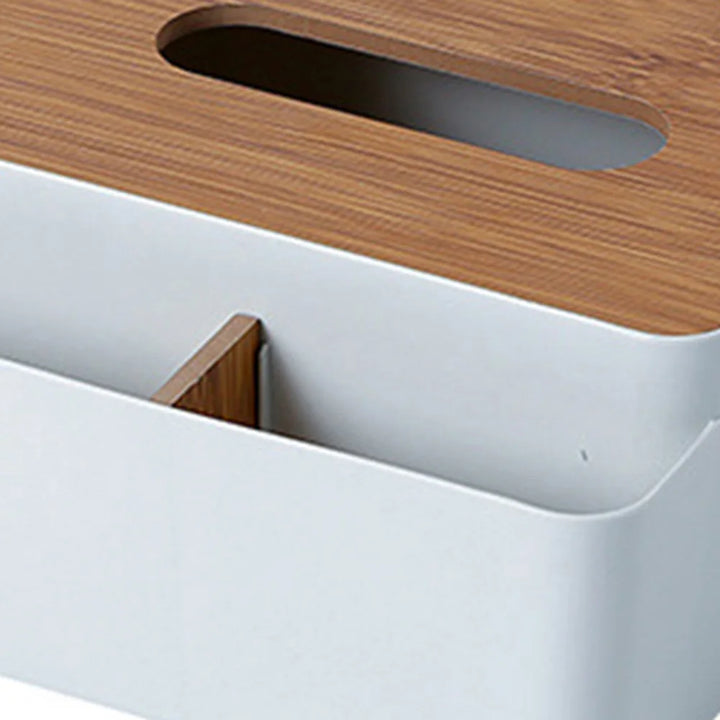 A close-up of a white plastic desktop organizer with a wooden lid featuring an oval handle and a divider inside, perfect as a stylish wooden cover storage box for your essentials.
