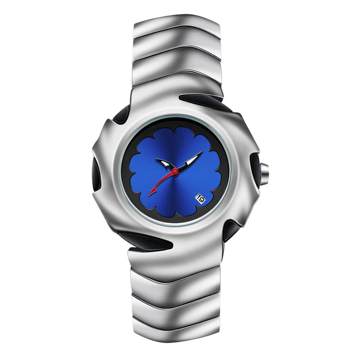 A modern, water-resistant stainless steel watch with a silver, wave-patterned metal band and a blue flower-shaped face. White hour and minute hands, a red second hand, and a small date window sit near the 4 o’clock position.