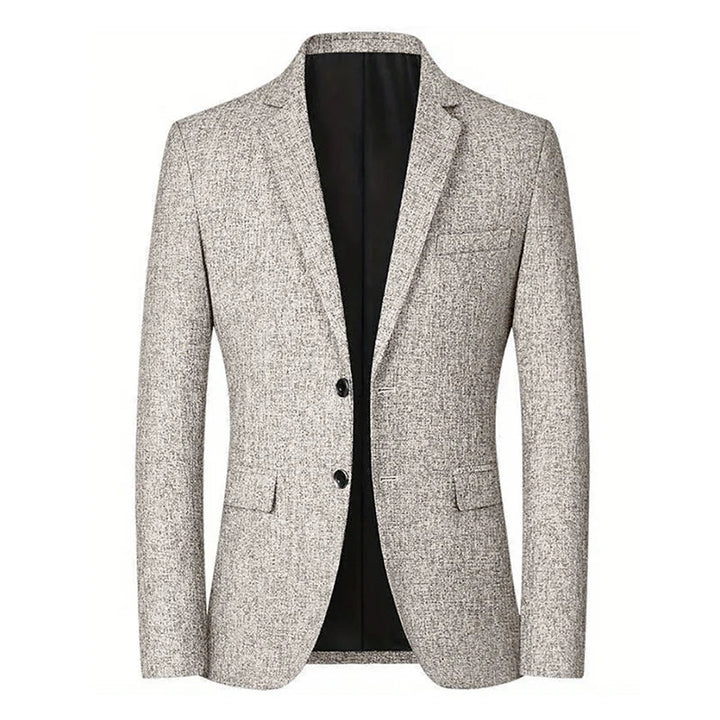 A light grey textured blazer with a tapered fit, two buttons, two front pockets, and a chest pocket, displayed on a plain white background. The blazer is open, revealing a black inner lining.
