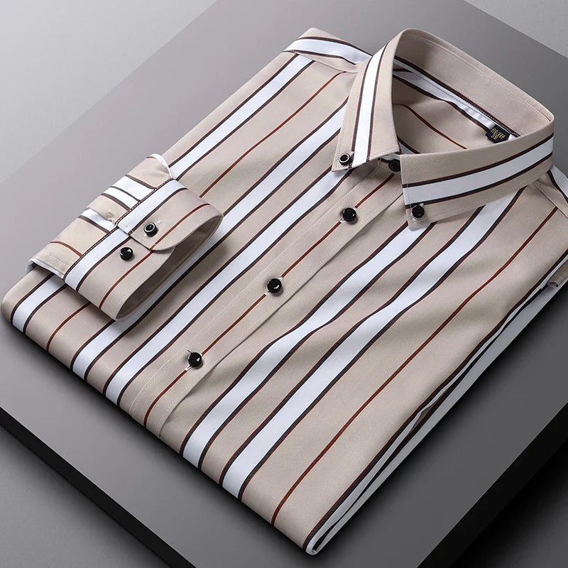 A neatly folded Hamilton Executive Classic Fit Shirt with beige, white, black, and brown vertical stripes, crafted from premium fabric, displayed on a gray surface.