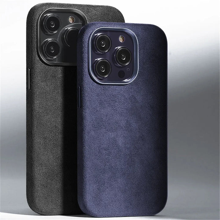 Two smartphones with textured, suede finish cases—one black and one dark blue—stand upright side by side. Both phones feature triple rear cameras against a smooth gradient light gray background.