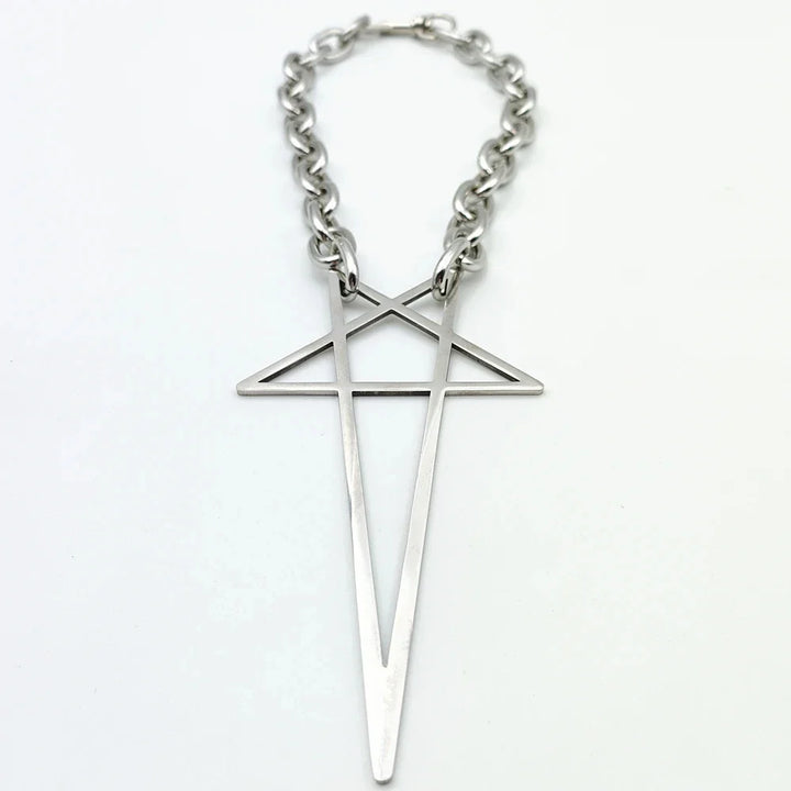 A chunky stainless steel necklace with a large geometric pendant, featuring a minimalist cross intersected by an inverted V shape—perfect as bold streetwear jewelry.