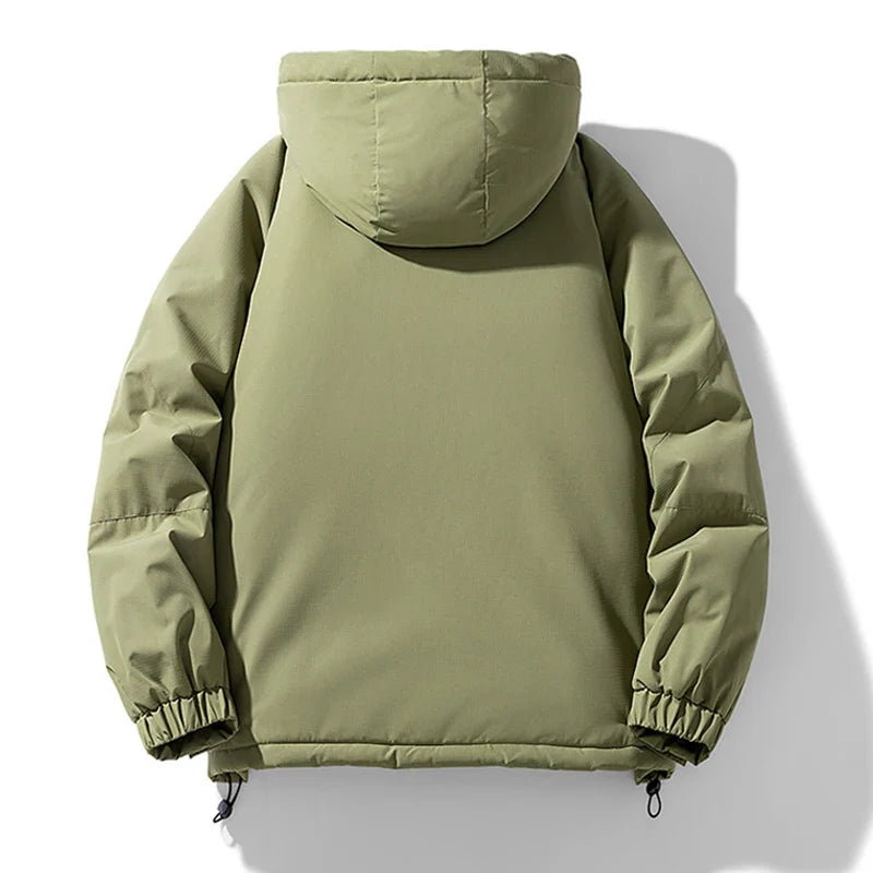 A light olive green hooded puffer jacket is shown from the back, featuring long sleeves, elastic cuffs, and a drawstring hem. This insulated jacket has a smooth texture and windproof design, set against a plain white background.