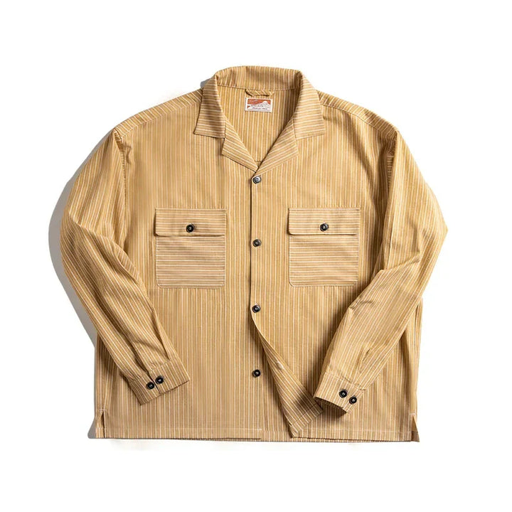 A long-sleeve, light brown pinstripe shirt made from high-quality cotton, featuring two chest pockets with buttons and black buttons on the front and cuffs, laid flat on a white background.