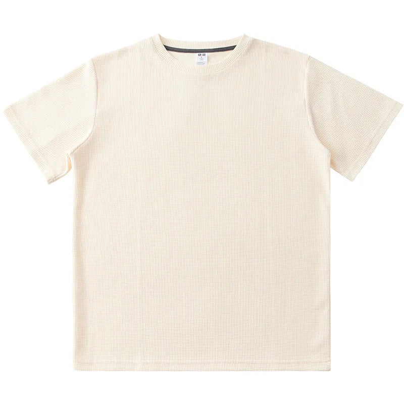 A plain, short-sleeved, cream-colored heavyweight shirt made from 260G cotton, laid flat on a white background.