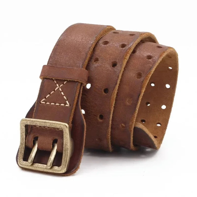 A brown cowhide belt with a brass buckle and multiple round holes, featuring visible stitching near the buckle, coiled on a white background for a rugged aesthetic.
