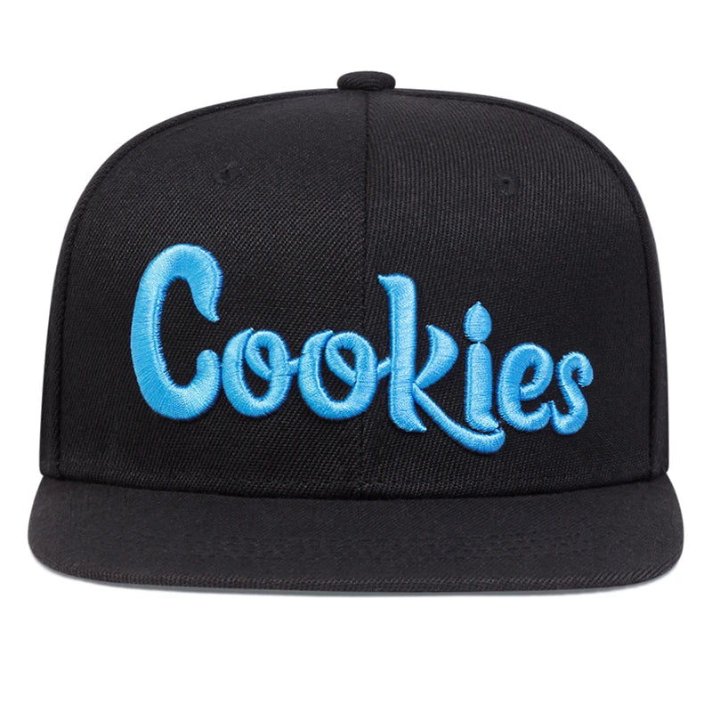 A black snapback hat with Cookies embroidered in large, light blue letters on the front, featuring breathable fabric for all-day comfort.