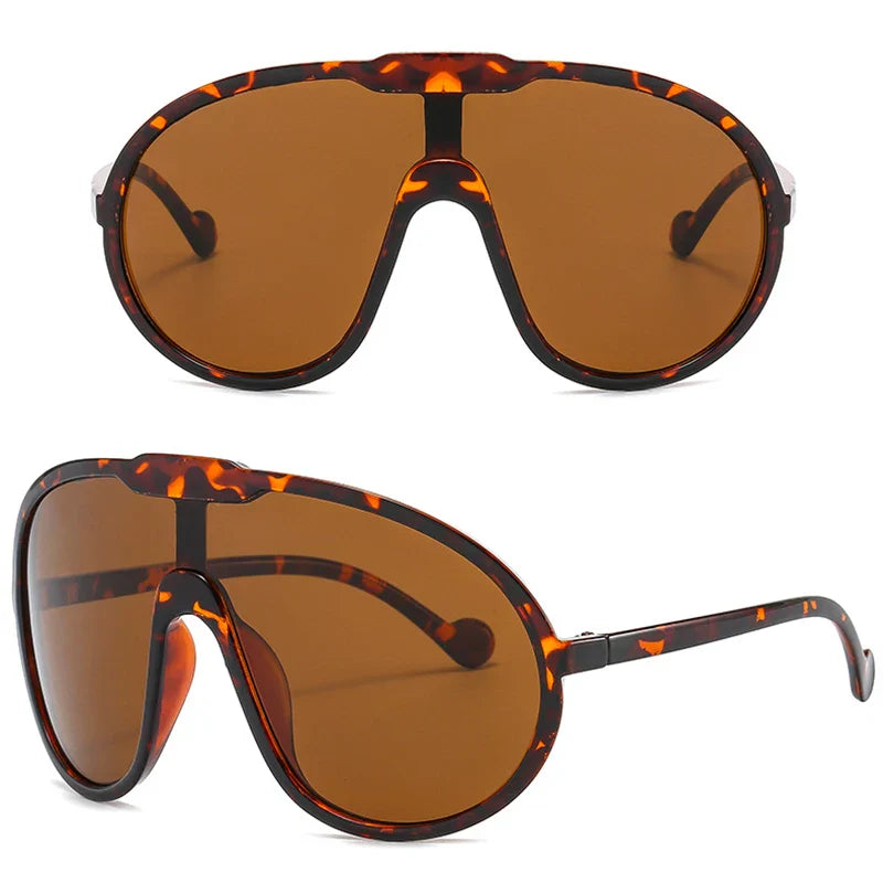 Two views of oversized sunglasses with a tortoise-shell pattern and brown lenses. The thick, rounded frames offer UV400 protection, making them perfect for outdoor activities. One view is front-facing, the other angled from the side.