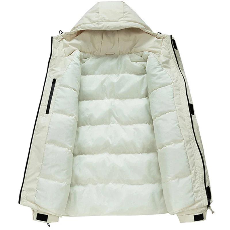 A cream-colored, insulated hooded puffer jacket with a detachable hood is shown open to reveal its quilted, padded interior and side pocket. The jacket is laid flat on a white background.