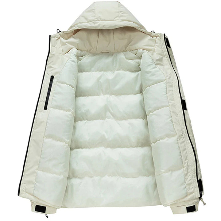 A cream-colored, insulated hooded puffer jacket with a detachable hood is shown open to reveal its quilted, padded interior and side pocket. The jacket is laid flat on a white background.