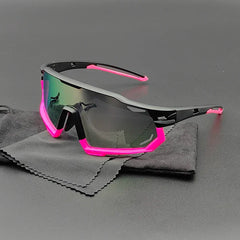 Olympus Sunglasses with a black frame and bright pink accents rest on a black cleaning cloth. These sporty shades feature polarized lenses for UV protection, and their reflective, slightly tinted finish stands out against the dark background.
