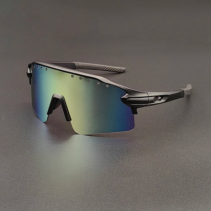 A pair of sleek, oversized sunglasses with a single, large, reflective lens that shifts from green to purple. The black frame features textured arms and a minimalist nose bridge, offering both style and UV400 protection against harmful rays.