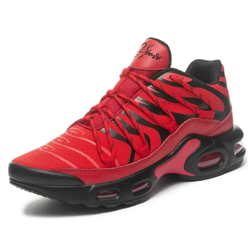 A red and black athletic sneaker with a breathable mesh upper, black sole, red laces with black accents, cushioned midsole, and air-cushioned heel. The tongue features a signature-style logo in black.