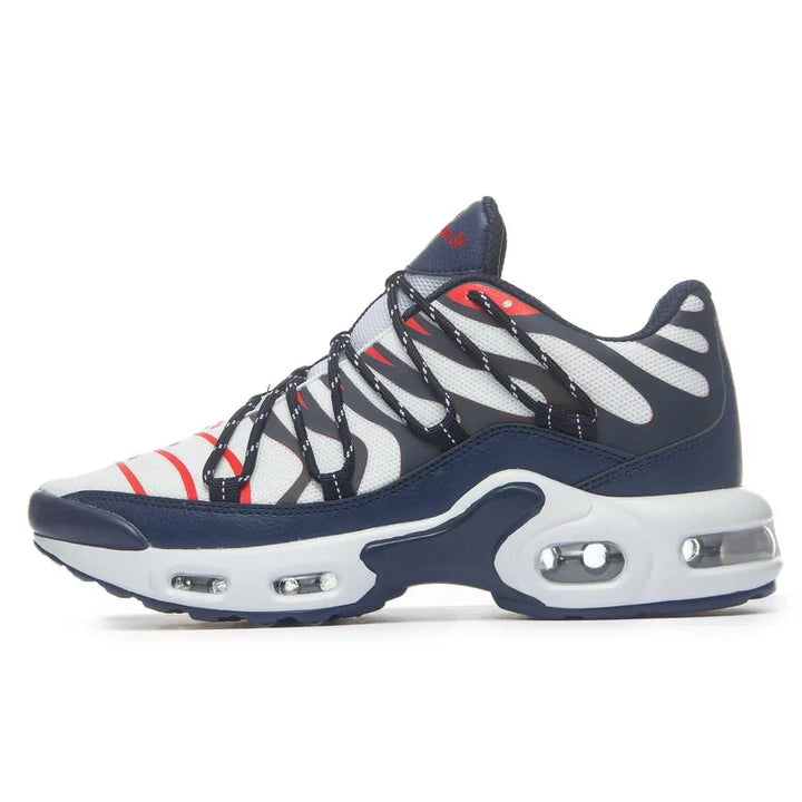 A stylish athletic sneaker featuring a breathable mesh upper with black and red wavy stripes, navy blue overlays, a cushioned midsole, and a white sole with visible air cushioning units in the heel and forefoot.