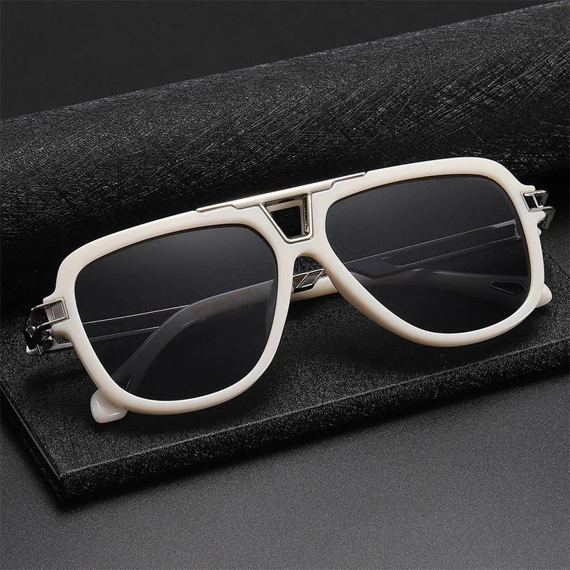 White-framed vintage sunglasses with dark lenses rest on a black textured case against a dark background, exuding classic aviator style and timeless appeal.