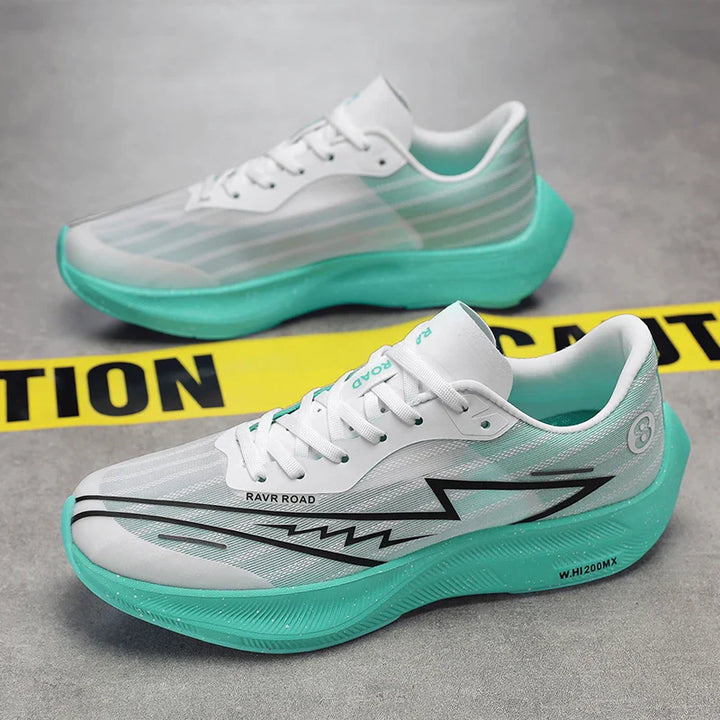 A pair of white athletic shoes with lightweight construction, teal shock-absorbing soles, and black zigzag designs are placed on a gray floor behind yellow caution tape.