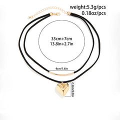 Double black cord velvet choker with a vintage heart pendant and a gold bar charm. Adjustable choker length: 35 cm plus 7 cm extension. Heart is 2.3 cm tall. Total weight: 5.3g (0.18oz).