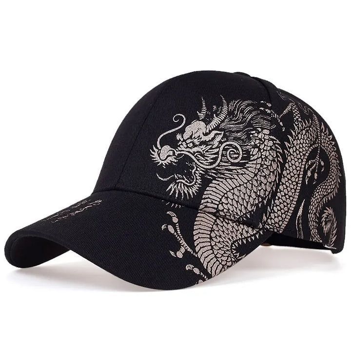 A black embroidered cap featuring an intricate silver dragon design that wraps around the left side and bill, perfect for showcasing cultural pride.