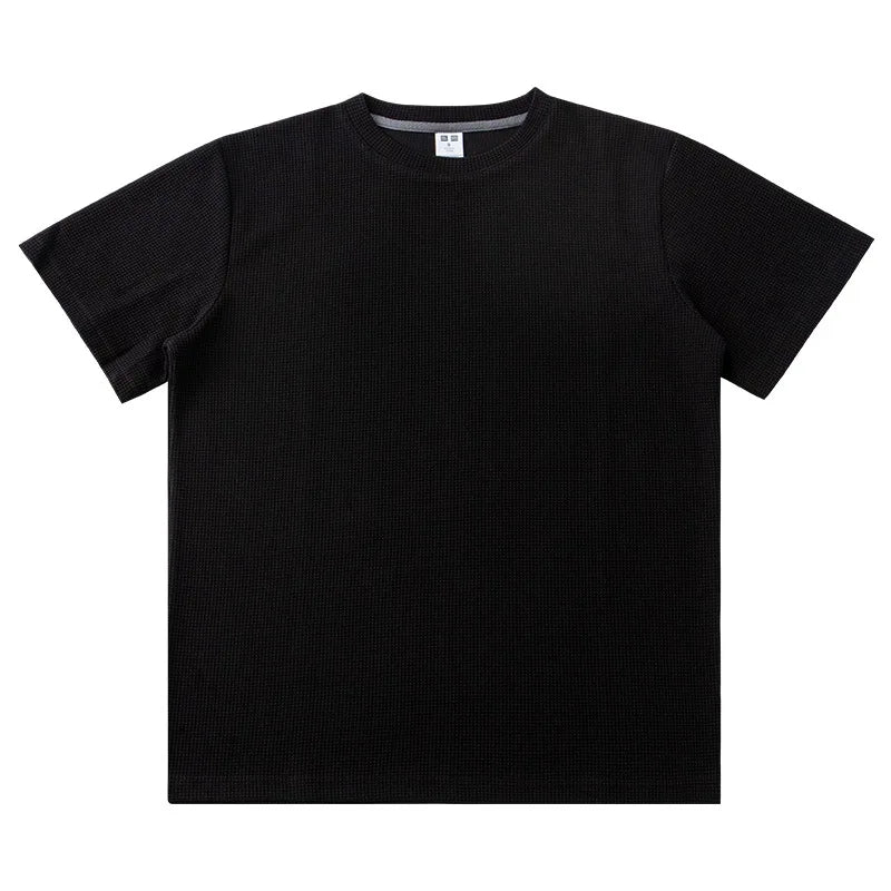 A plain black short-sleeve crew neck heavyweight shirt, crafted from soft 260G cotton, is laid flat on a white background.