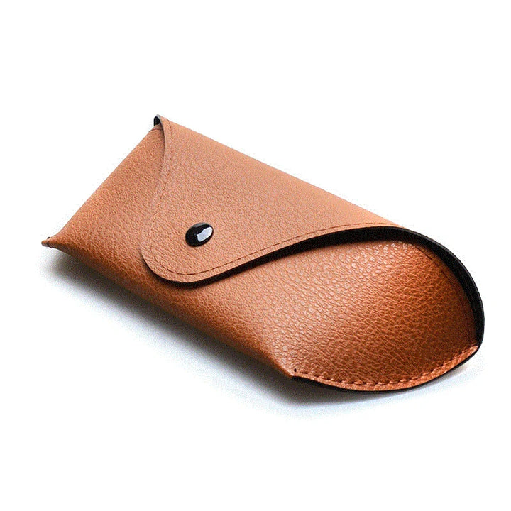 A brown, textured vegan leather sunglasses case with a flap closure, secured by a black snap button, rests on a white background for a stylish and protective touch.