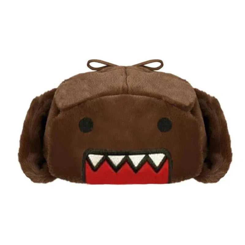 A plush, brown earmuff made from soft plush material features a cartoonish face with large, white triangle teeth, a red mouth, and round black eyes. The playful design adds a fun touch to your winter styling.