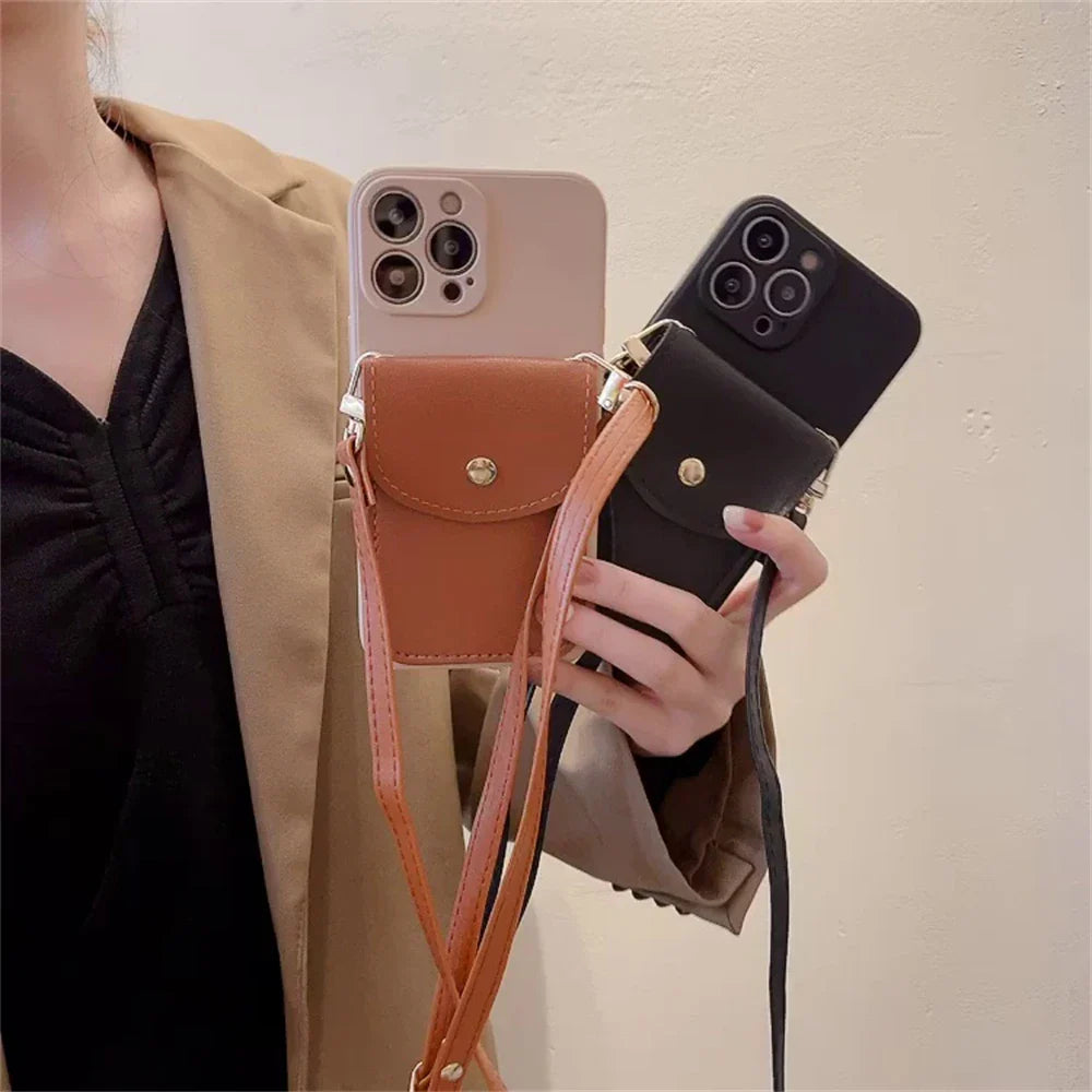 A person wearing a tan blazer holds two smartphones, each in a phone case wallet—one beige and brown, the other black. Both cases feature a leather detachable strap and a secure cardholder for added convenience.