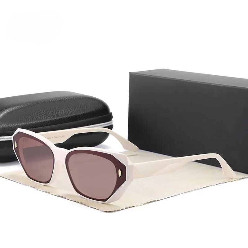 Beige square polarized sunglasses with dark lenses are displayed on a beige cloth, beside a black hard case and a black rectangular box, all set against a white background.